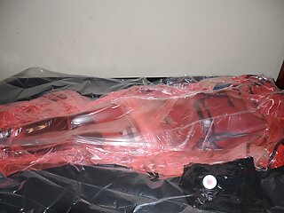 Mar 2 2023 - Vacpacked In My Long Red Raincoat Under My Pvc Aprons And Pink Pvc Sack free video